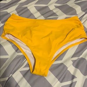 High waisted yellow bathing suit bottoms